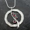 Sterling Silver Journey Circle of Love Garnet Necklace
